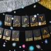 Happy new year banner i sort og guld